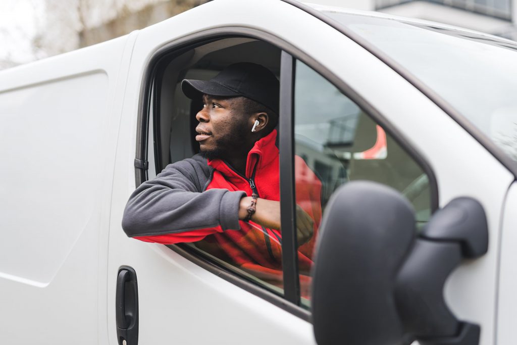 Man looking out of van window