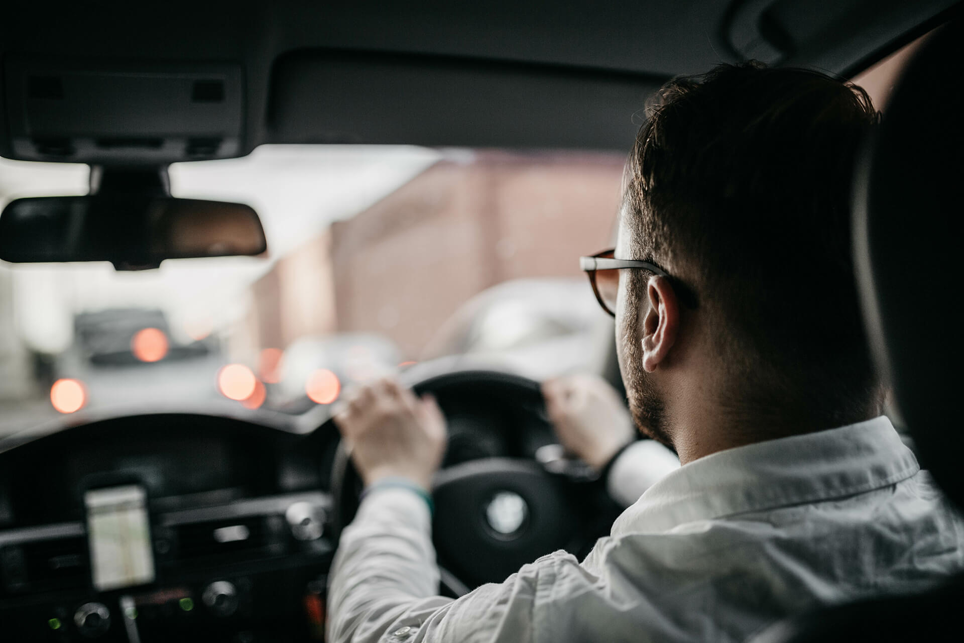 shirted man driving