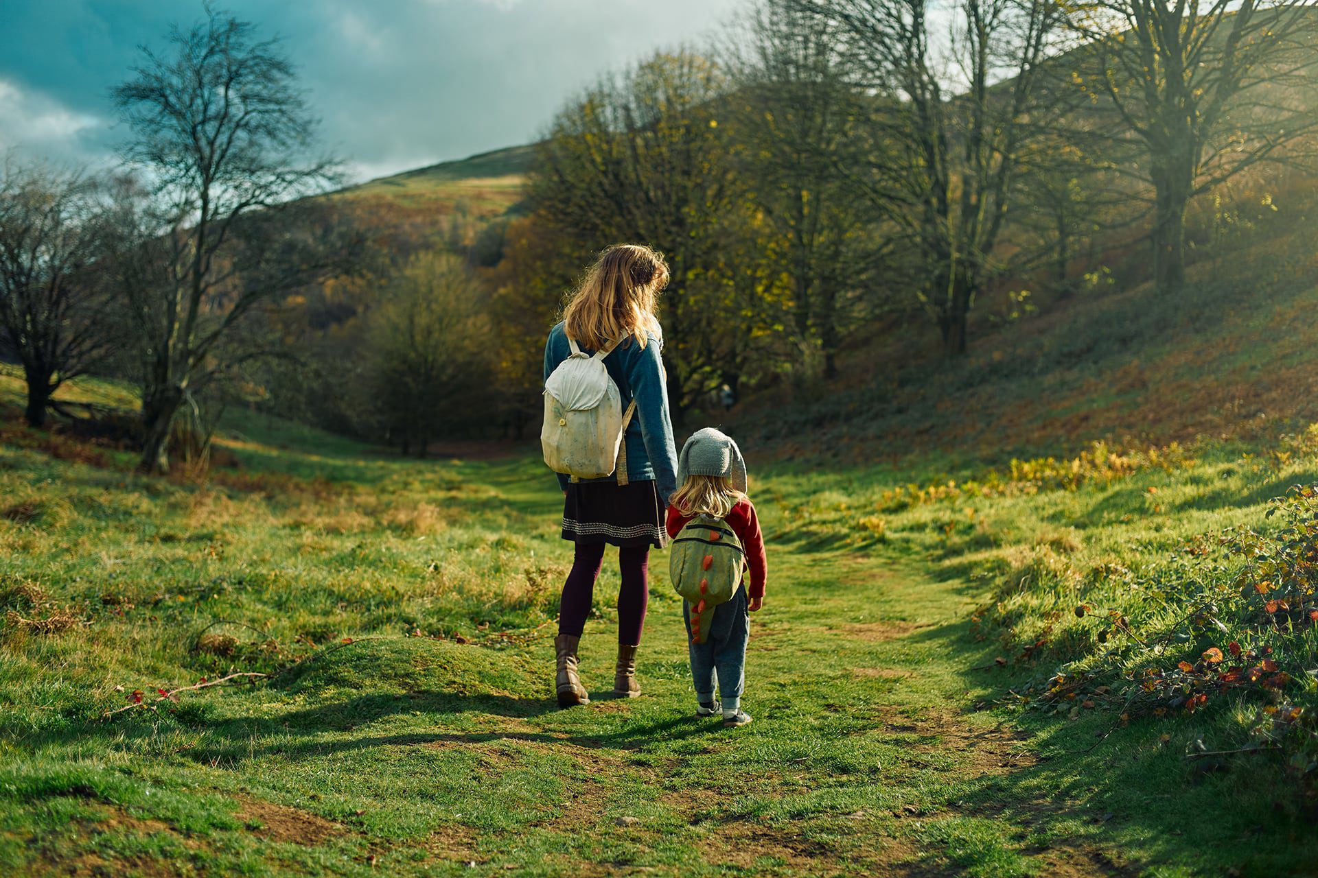 adult and child walking