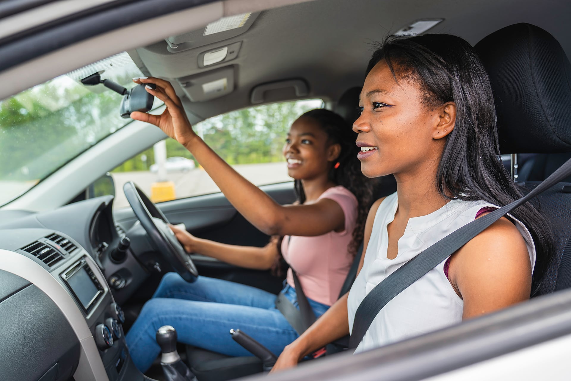 two ladies in a car