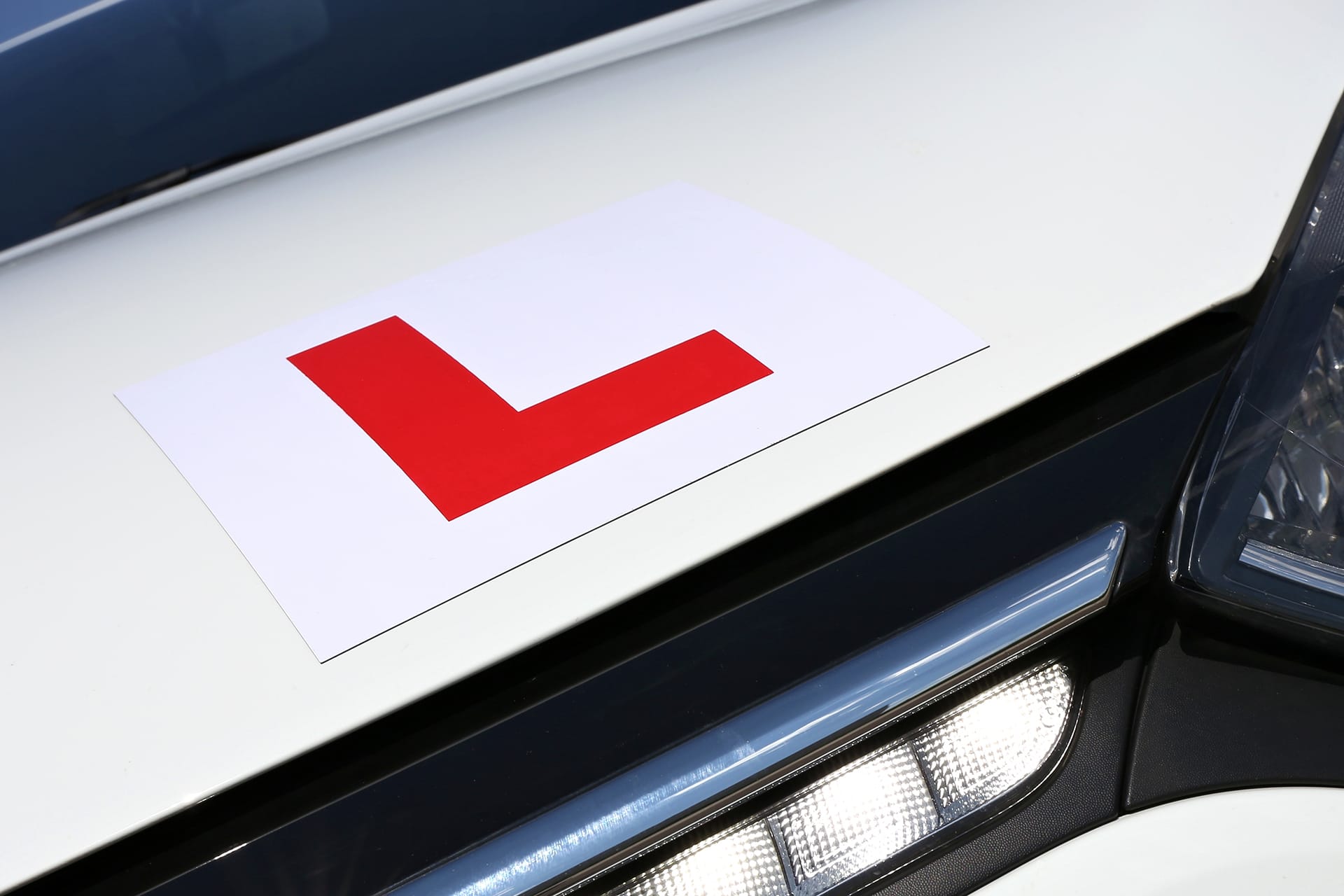 L plate on the bonnet of a car
